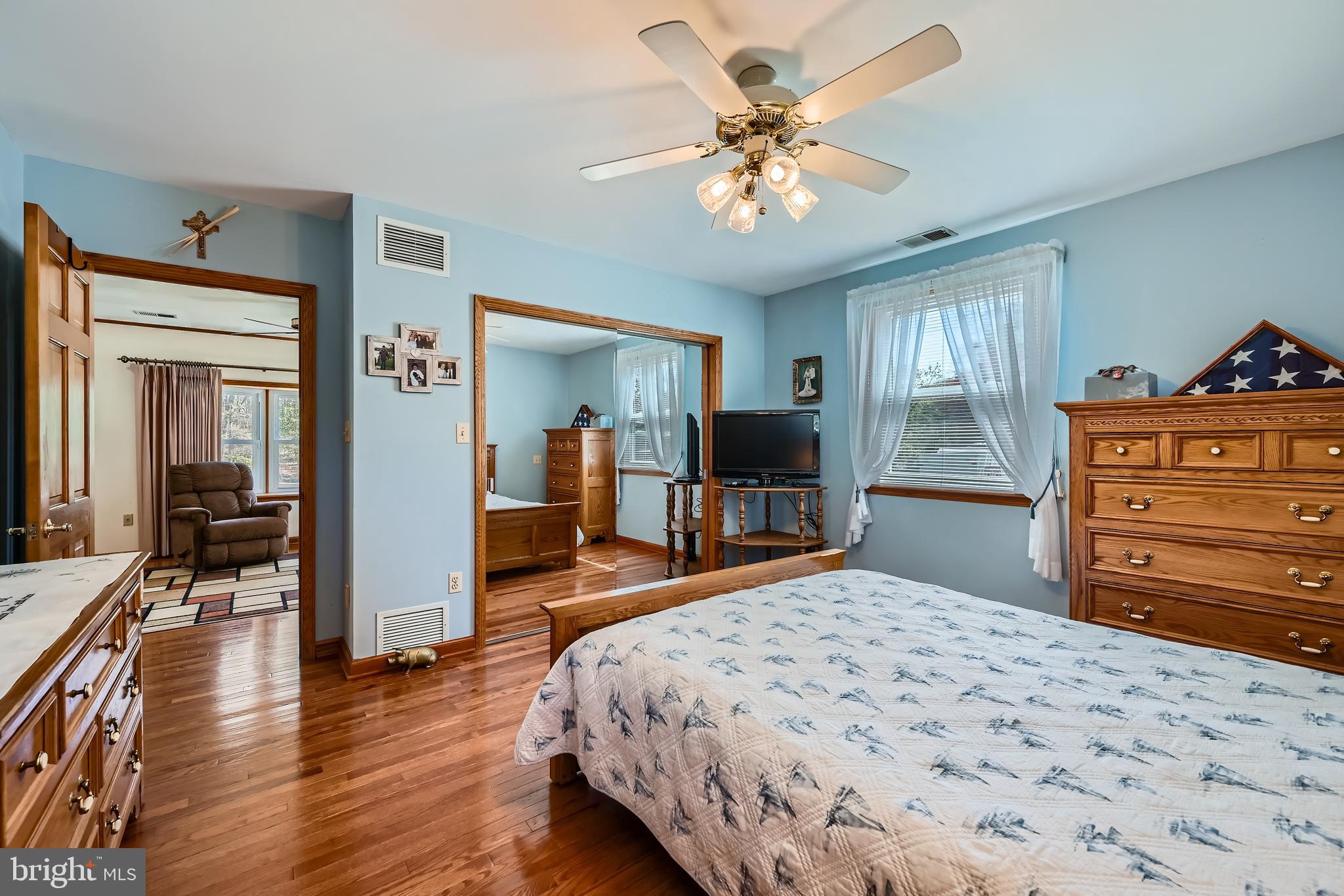 1722 Anne Avenue Baltimore, MD 21221 - Photo 14 of 28 a bedroom with a bed and wooden floor