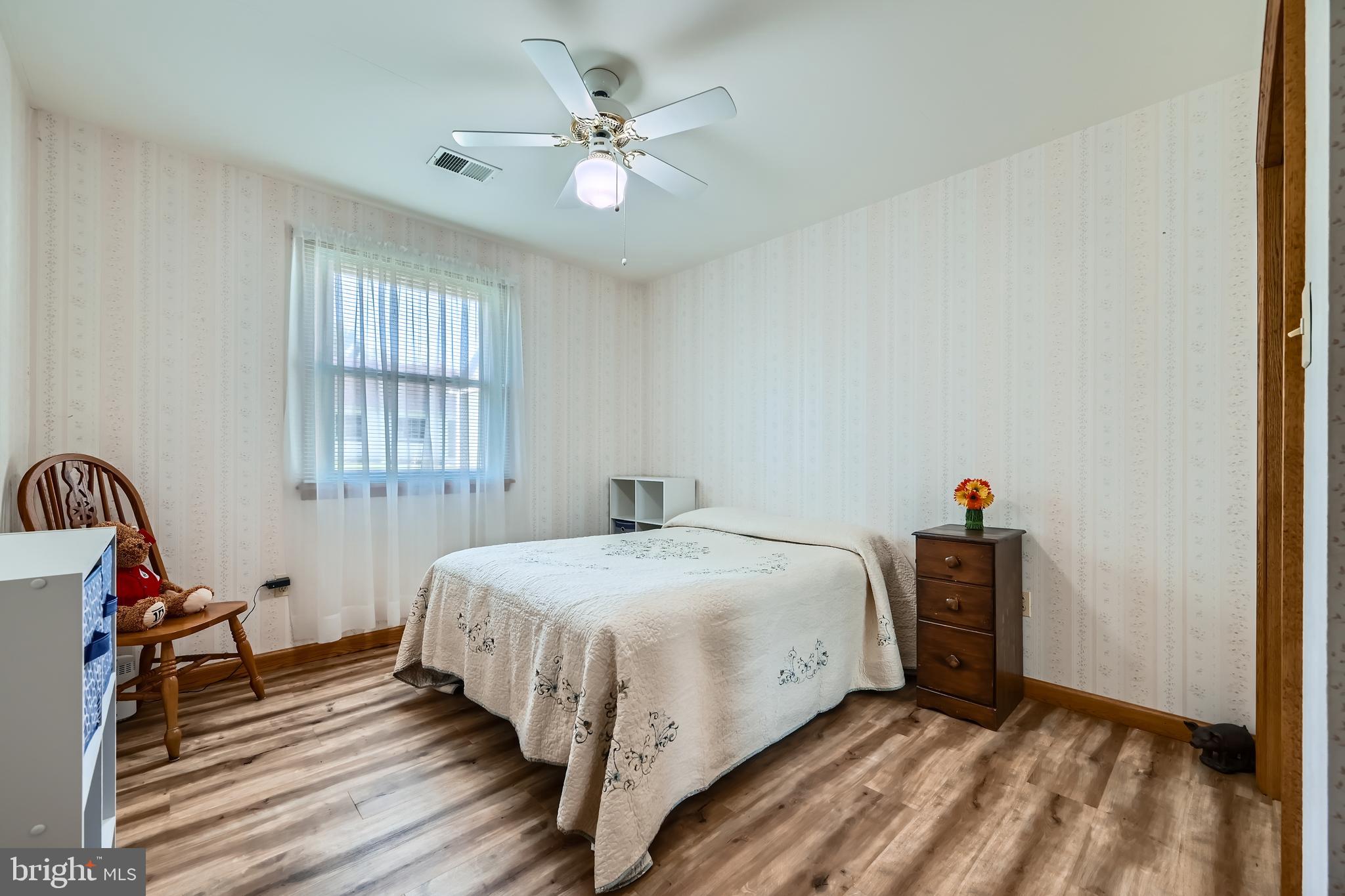 1722 Anne Avenue Baltimore, MD 21221 - Photo 18 of 28 a bed room with a bed and a window