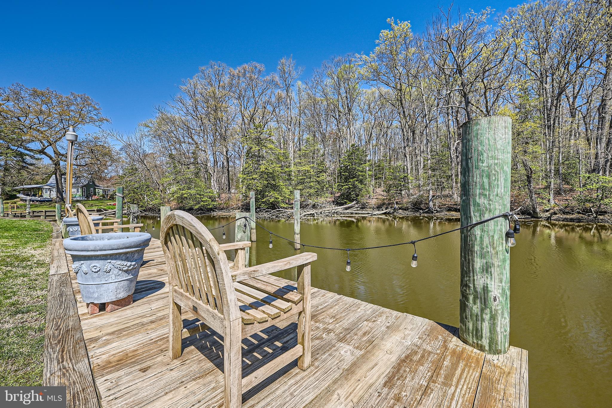 1722 Anne Avenue Baltimore, MD 21221 - Photo 25 of 28 a view of a lake with a deck