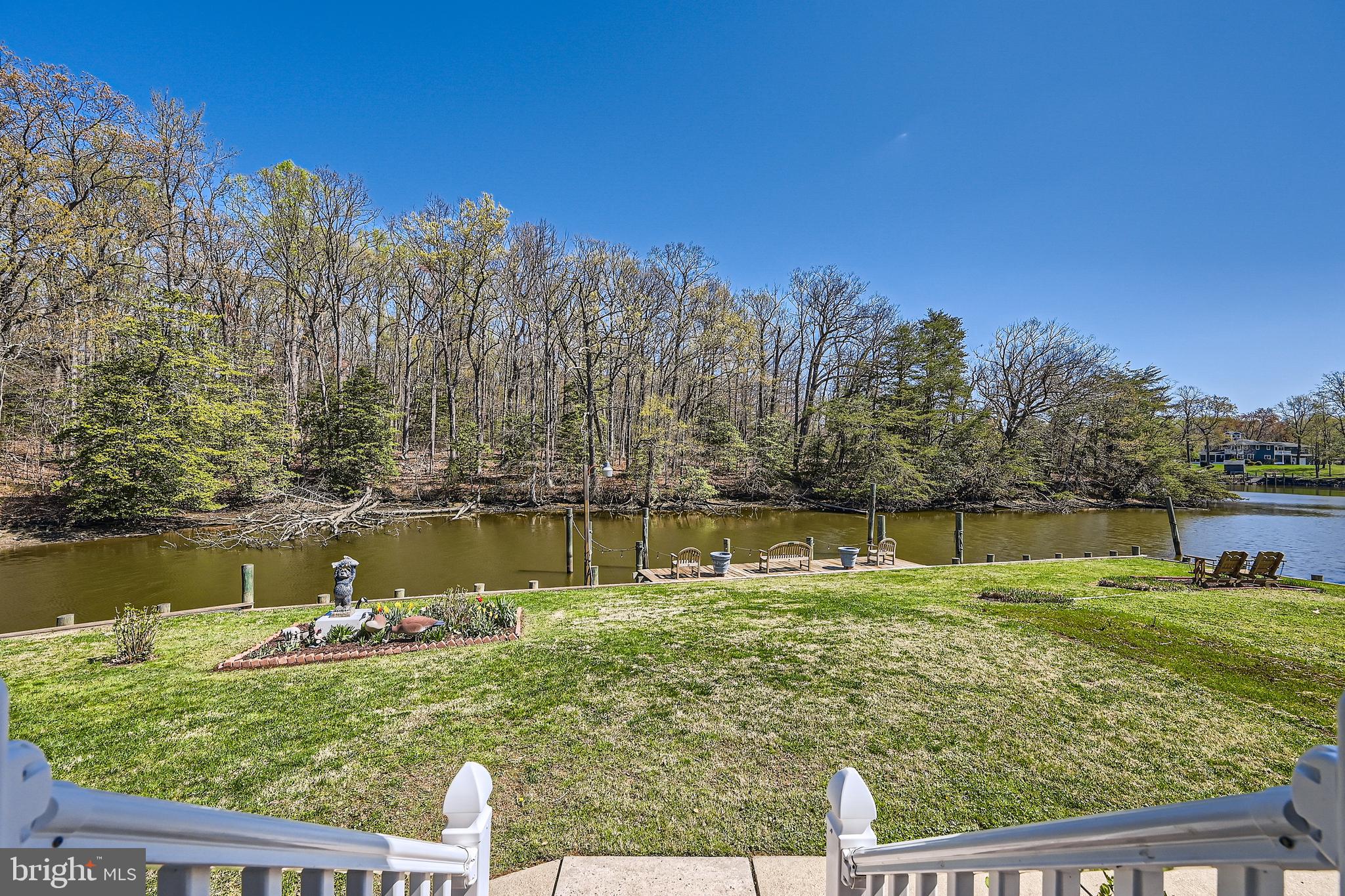 1722 Anne Avenue Baltimore, MD 21221 - Photo 27 of 28 a view of a lake with a yard and a large window