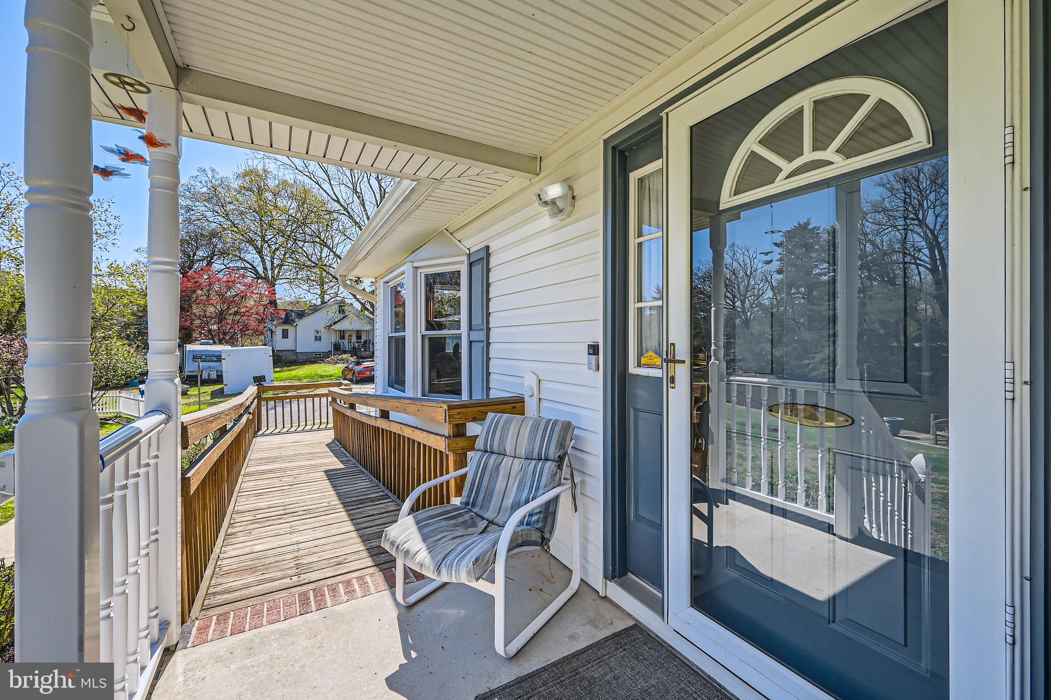 1722 Anne Avenue Baltimore, MD 21221 - Photo 5 of 28 a view of a patio with couches chairs and potted plants