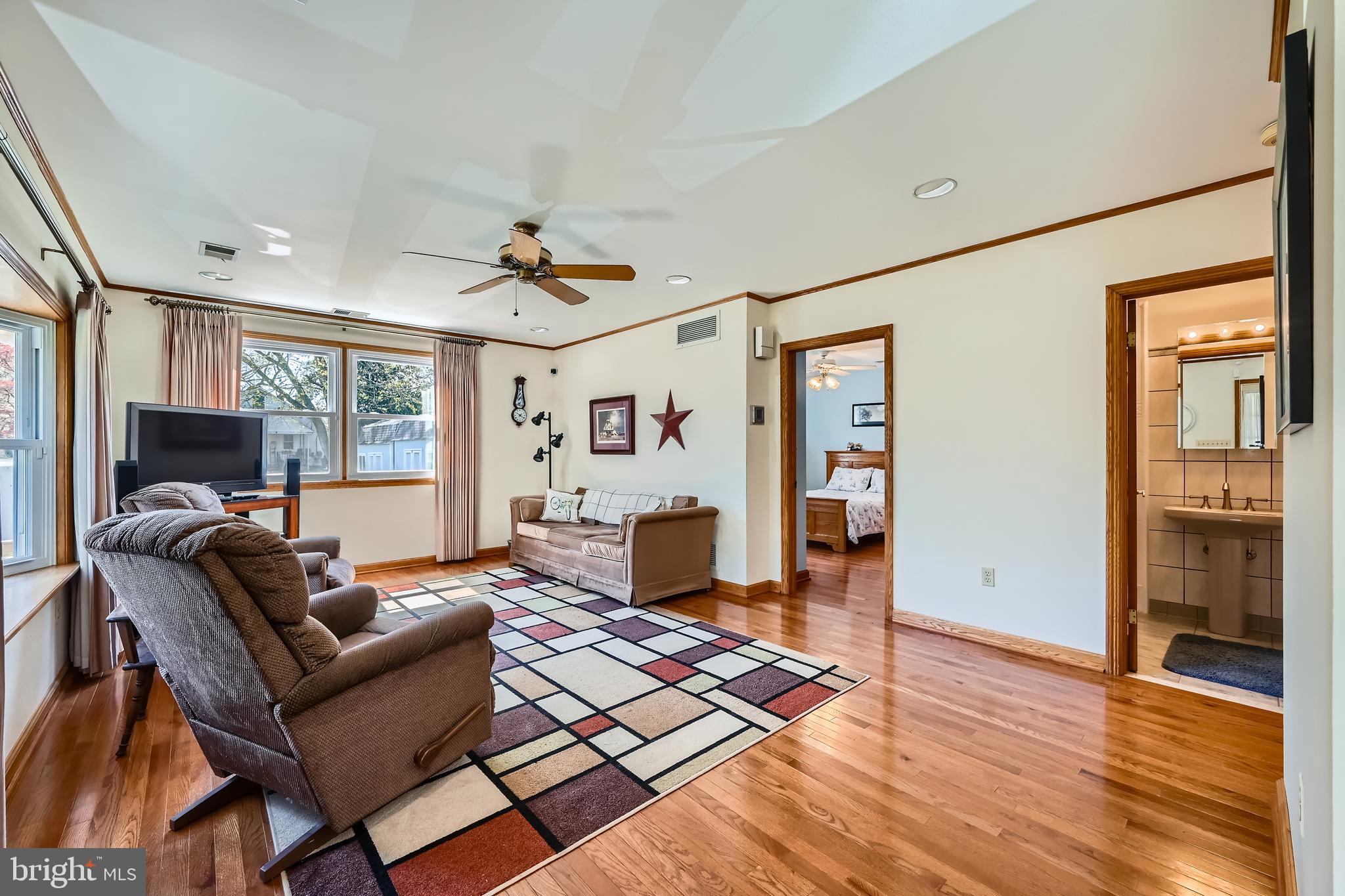 1722 Anne Avenue Baltimore, MD 21221 - Photo 6 of 28 a living room with furniture and a fireplace