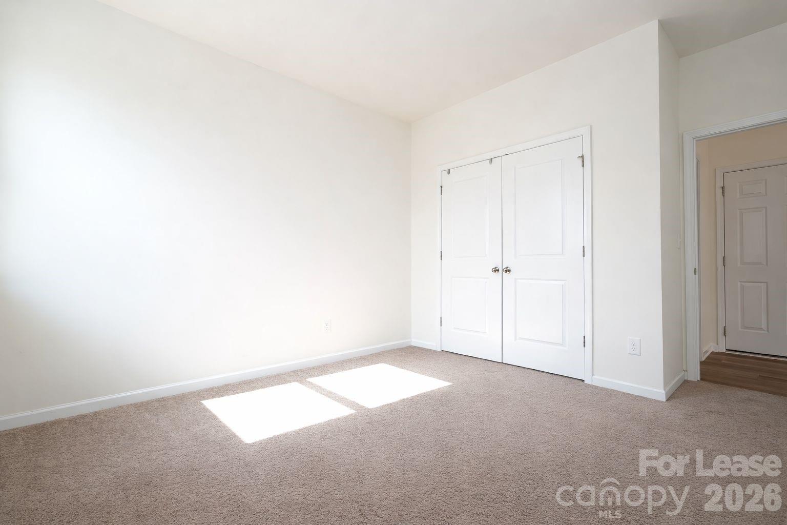 3220 Berry Creek Road Charlotte, NC 28214 - Photo 19 of 41 a view of an empty room