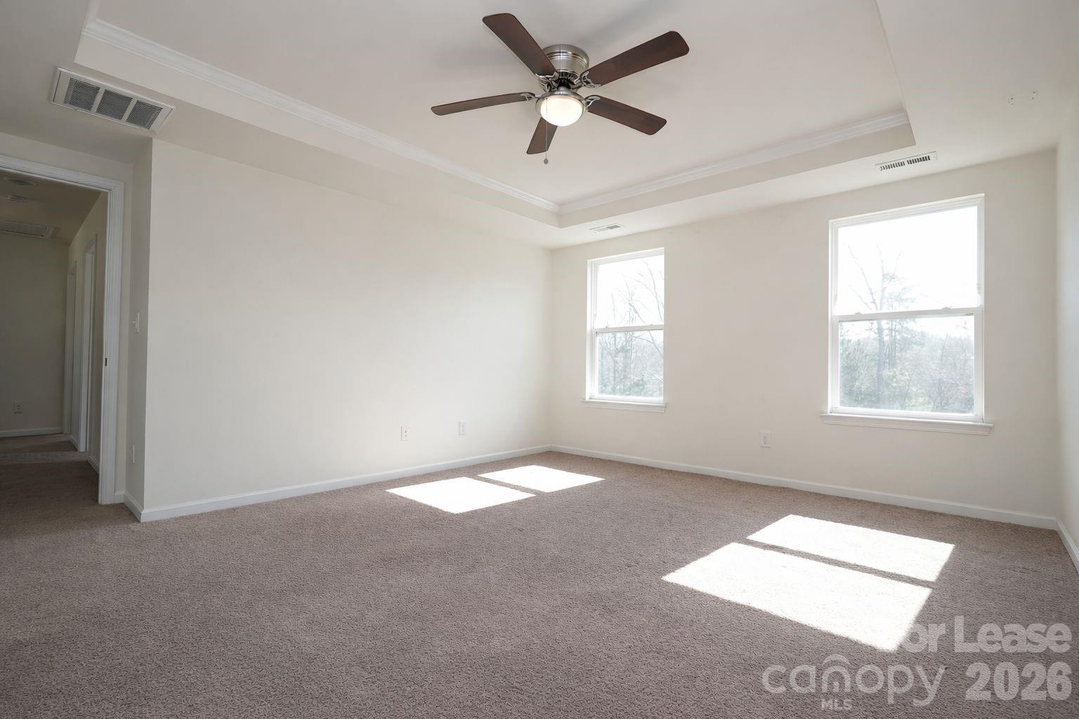 3220 Berry Creek Road Charlotte, NC 28214 - Photo 28 of 41 a view of an empty room with a window