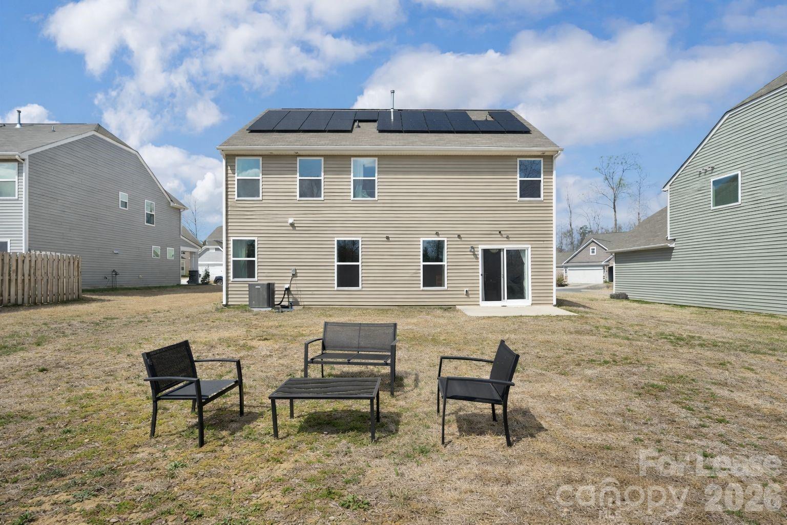 3220 Berry Creek Road Charlotte, NC 28214 - Photo 34 of 41 a view of a house with backyard and sitting area