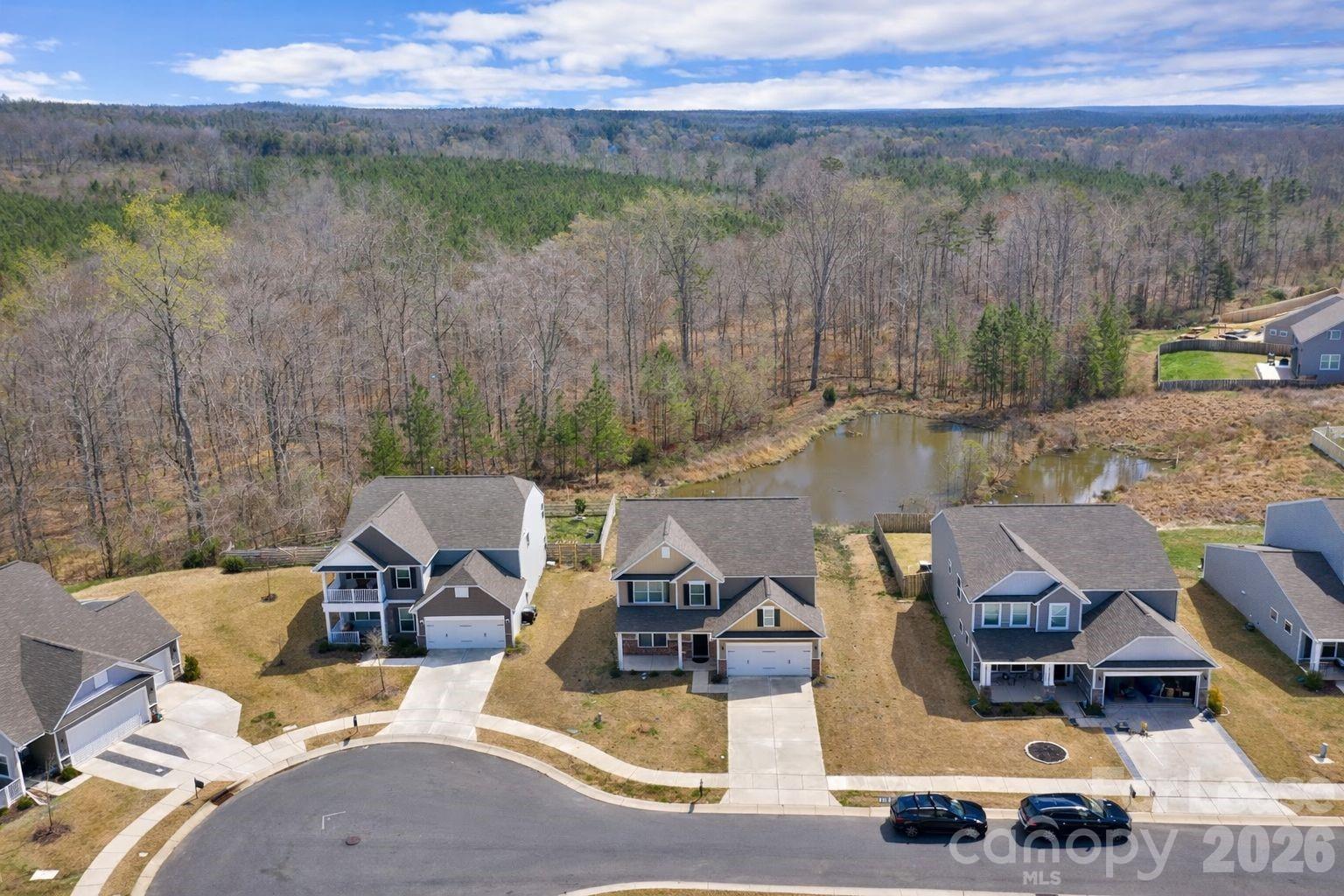 3220 Berry Creek Road Charlotte, NC 28214 - Photo 38 of 41 a view of a lake with couches