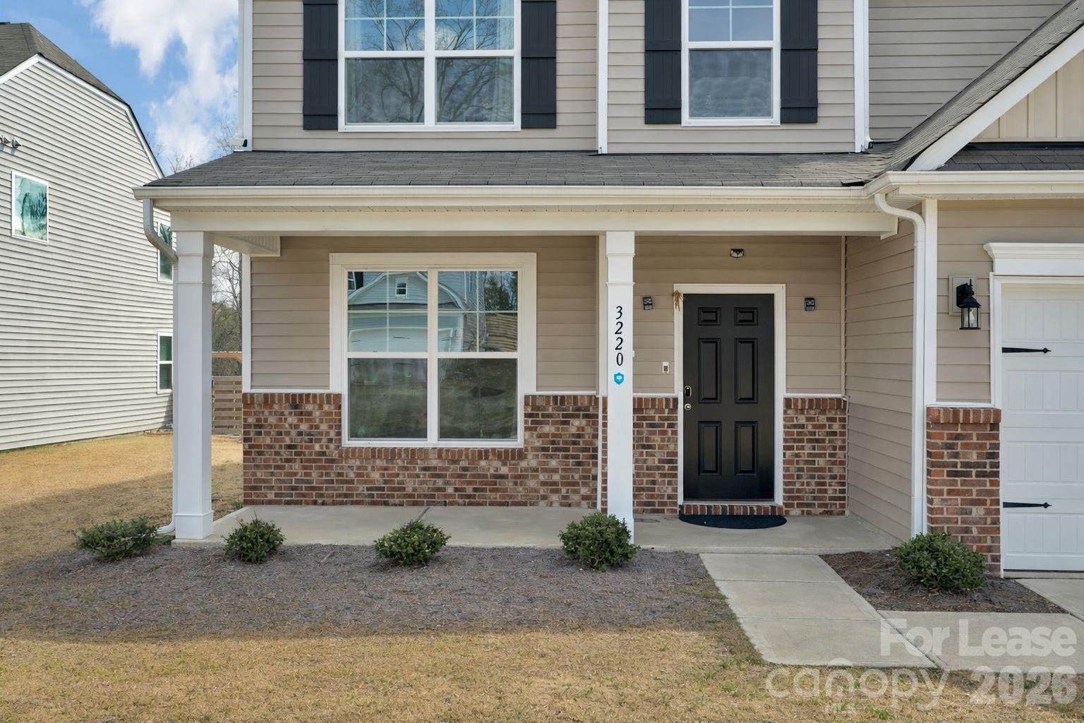 3220 Berry Creek Road Charlotte, NC 28214 - Photo 6 of 41 a front view of a house