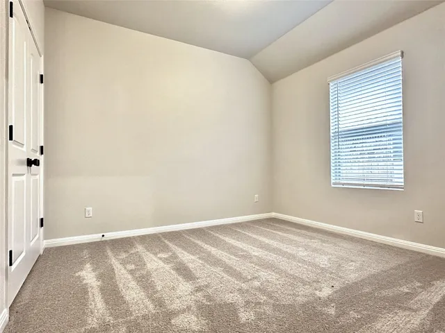 a view of a room with a window