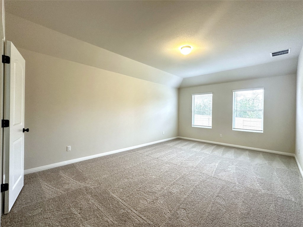 141 Rita Blanca Bend Bastrop, TX 78602 - Photo 10 of 23 an empty room with windows