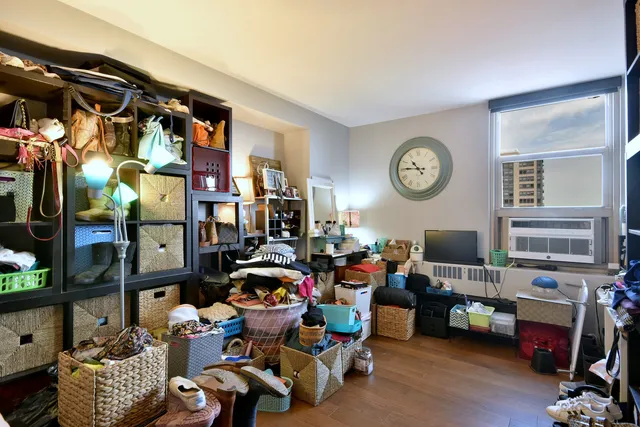 a very nice looking room with many windows and a table