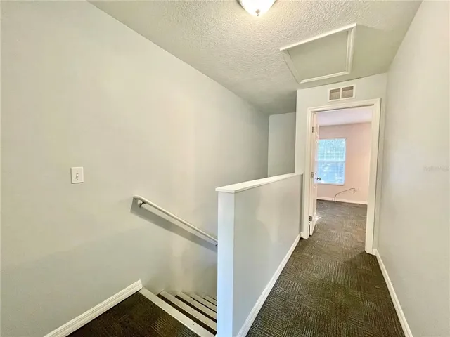 a view of a hallway with hallway