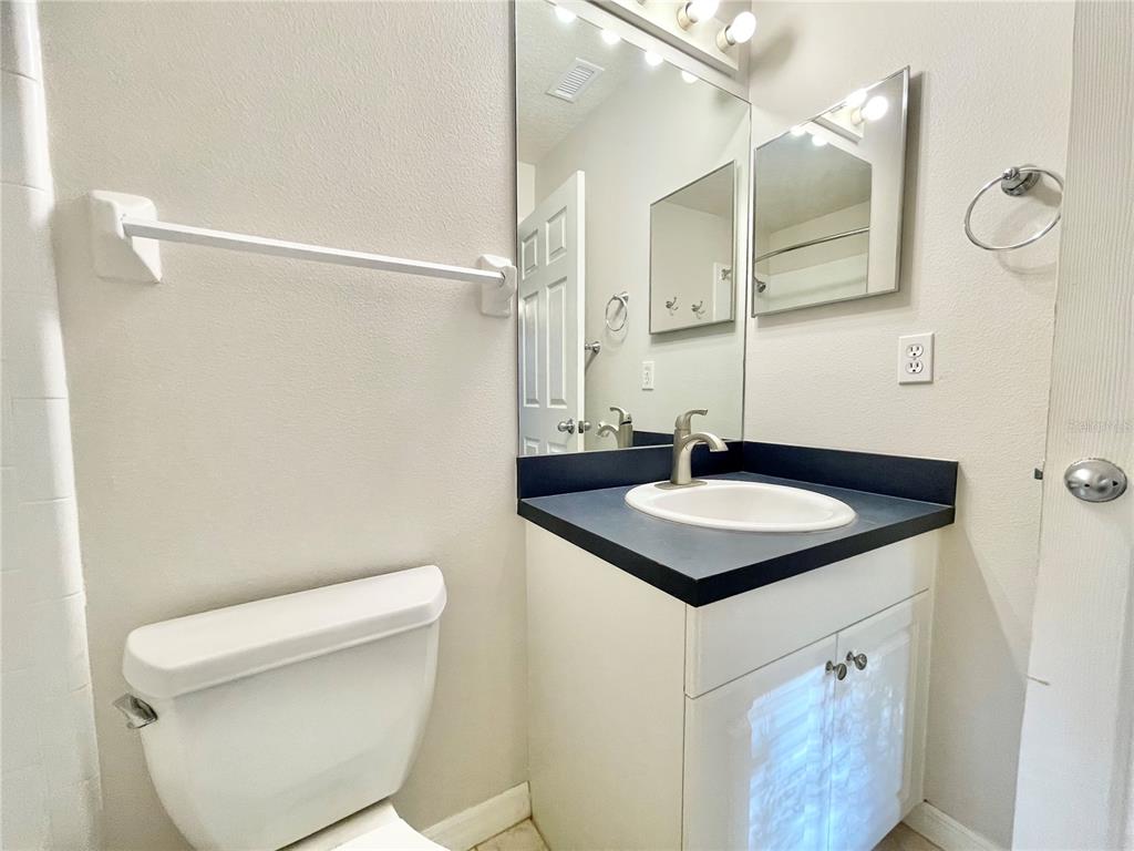 2348 Southwest 42nd Drive, Unit 151 Gainesville, FL 32607 - Photo 21 of 28 a bathroom with a sink toilet and shower