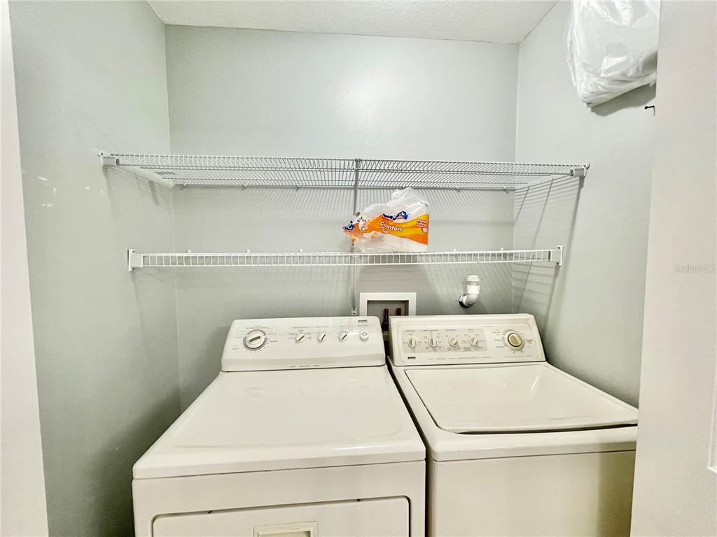 2348 Southwest 42nd Drive, Unit 151 Gainesville, FL 32607 - Photo 24 of 28 a utility room with dryer and washer