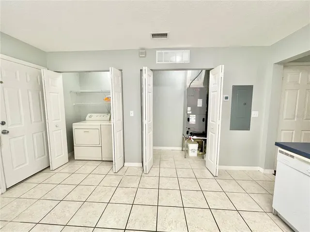 a bathroom with a shower and a glass door shower