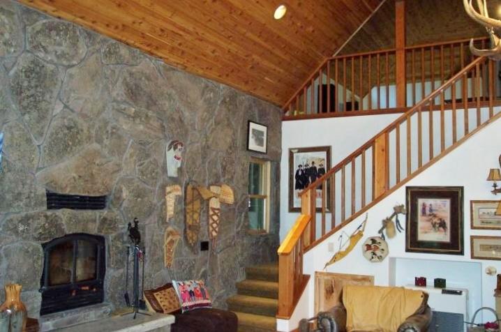 7637 Pegnan Road Shingletown, CA 96088 - Photo 18 of 22 Stone wall with fireplace