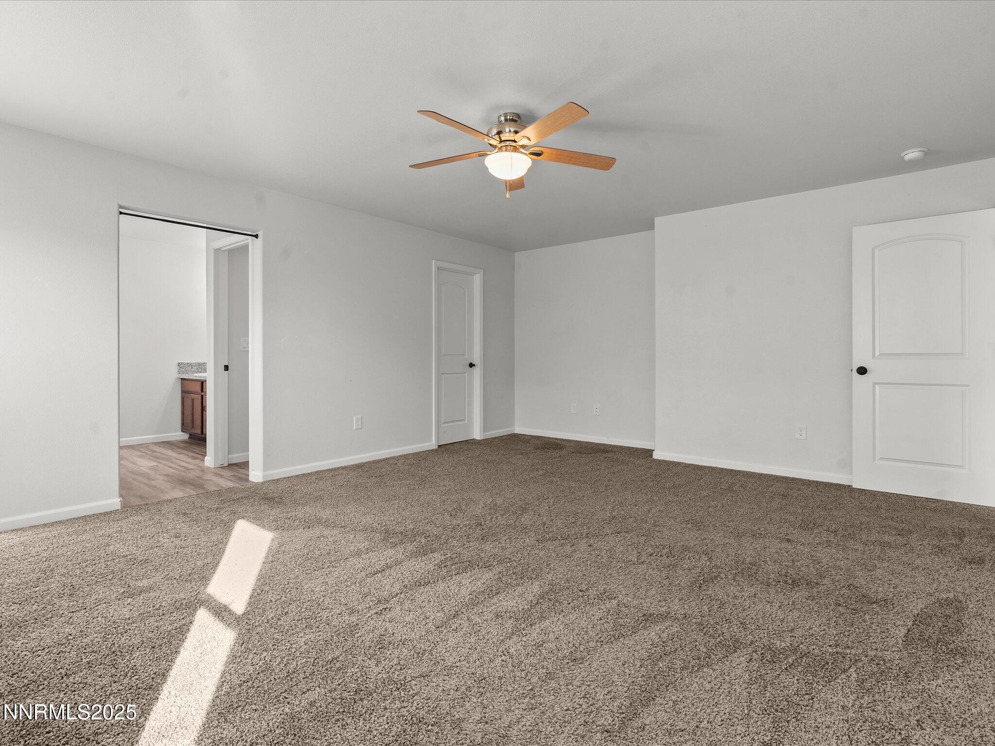 2041 Verona Drive Fallon, NV 89406 - Photo 19 of 45 a view of a livingroom with a ceiling fan and window