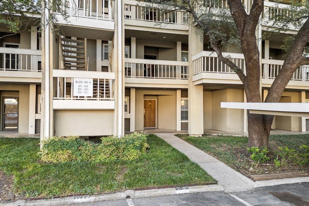 5310 Keller Springs Road, Unit 612 Dallas, TX 75248 - Photo 27 of 33 View of front of property featuring stucco siding