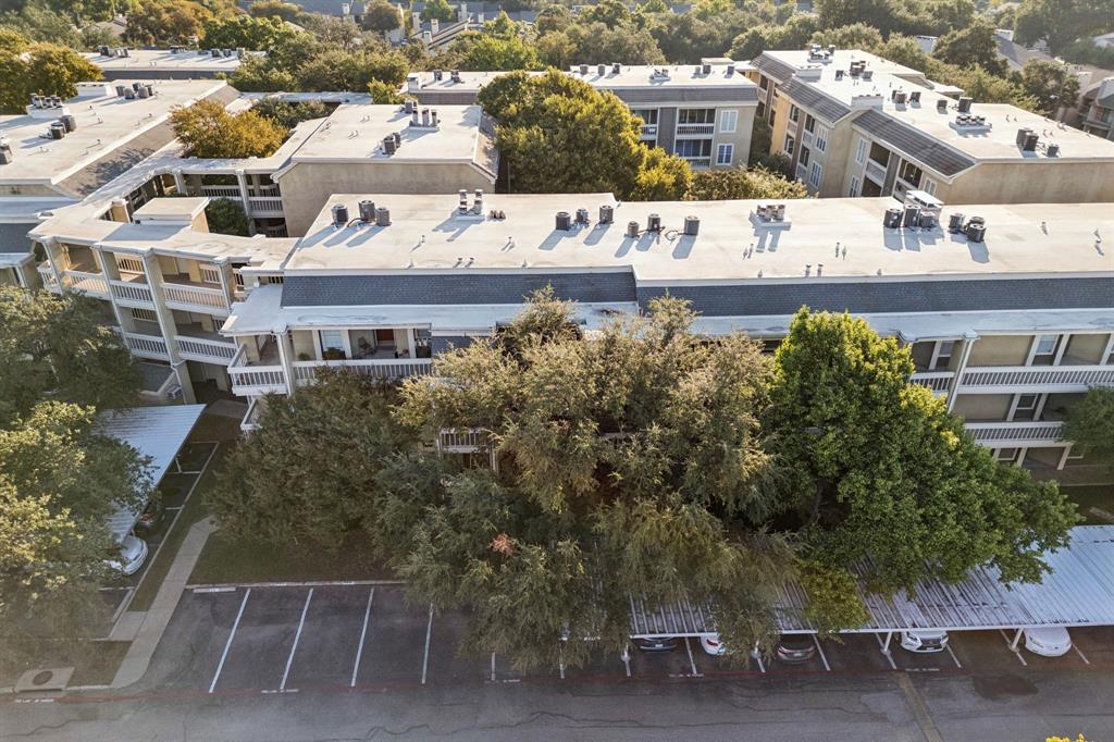 5310 Keller Springs Road, Unit 612 Dallas, TX 75248 - Photo 30 of 33 Bird's eye view with mature trees