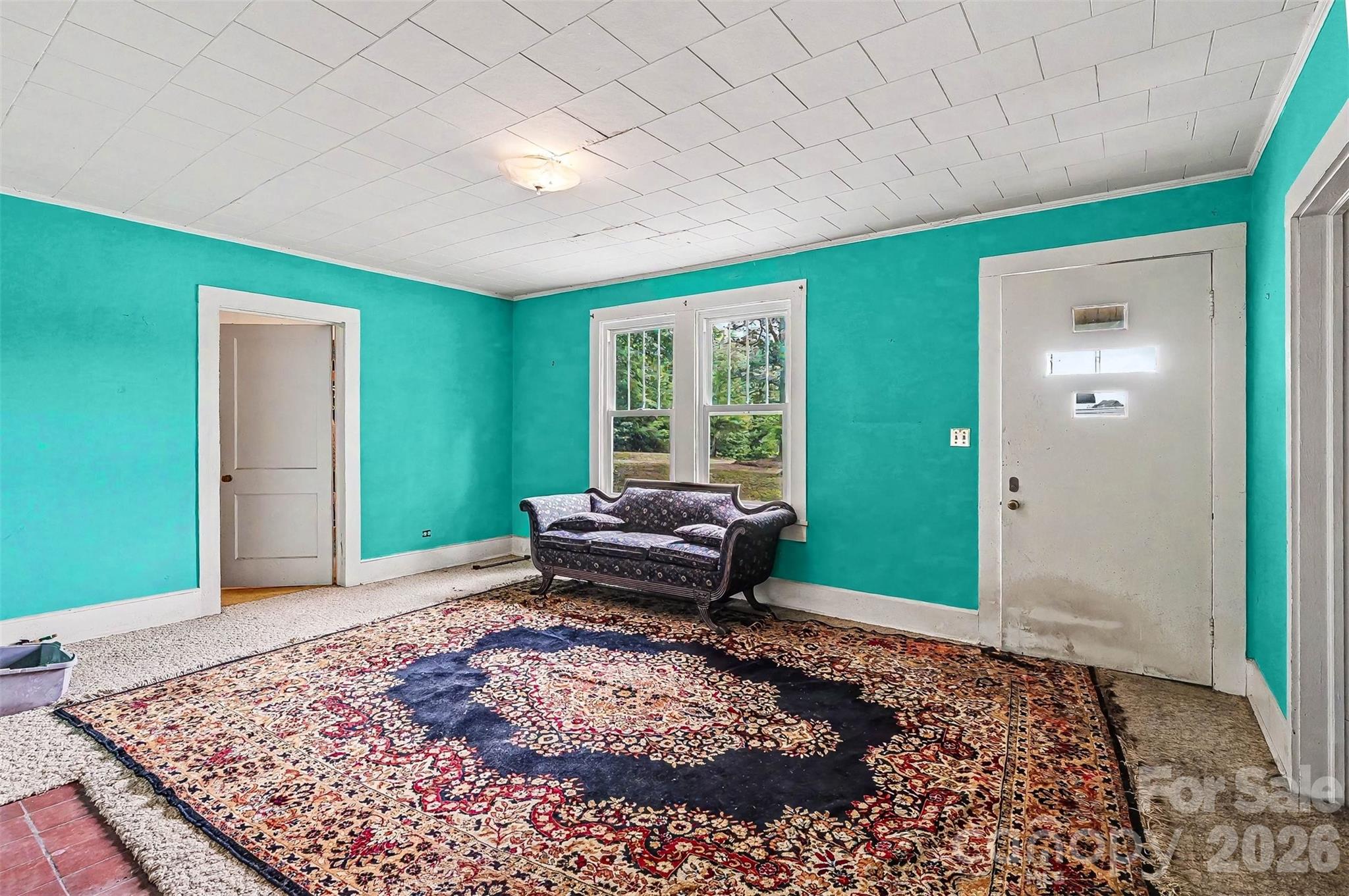 1116 Medlin Road Monroe, NC 28112 - Photo 3 of 40 a living room with furniture and a rug