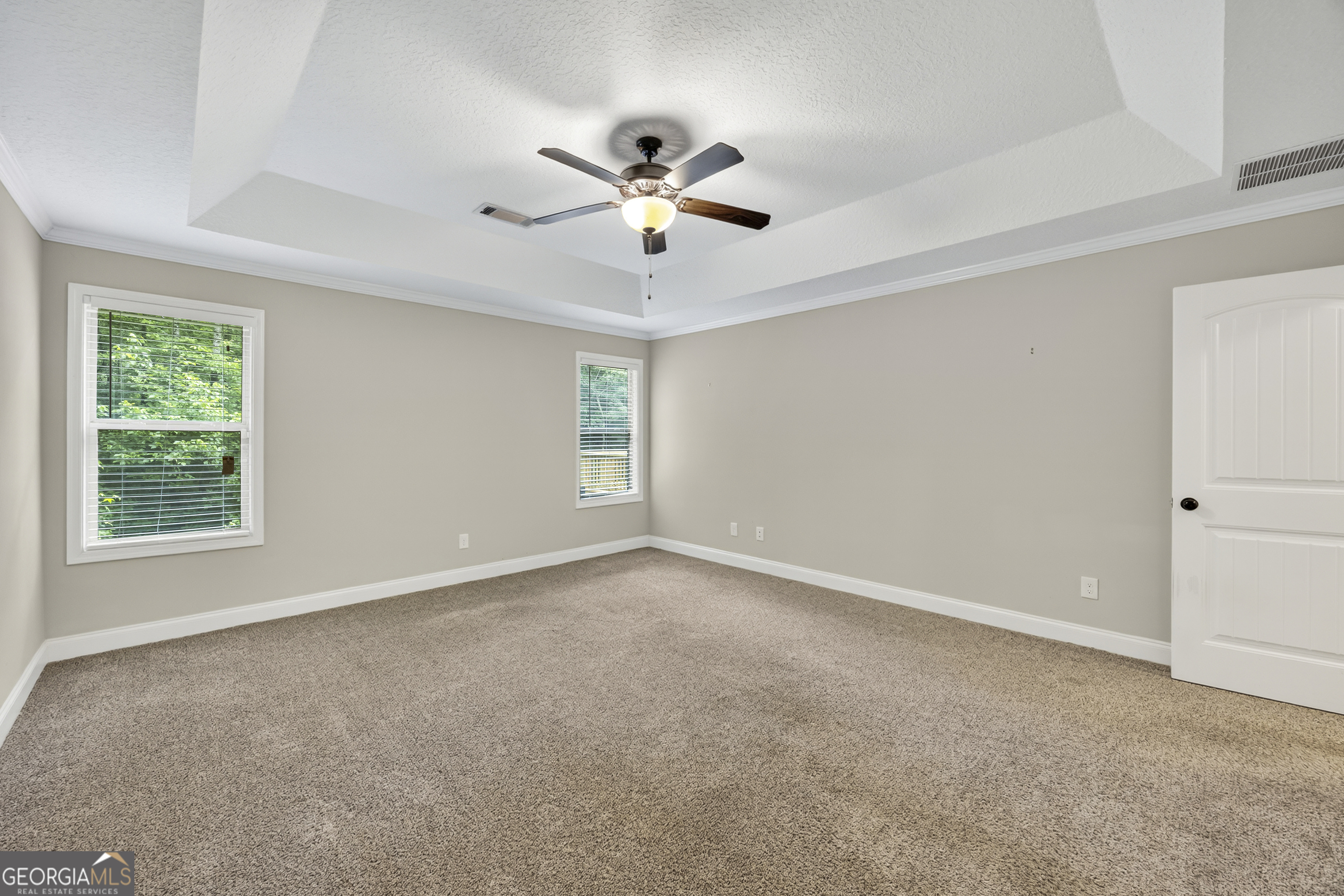 717 Oconee Lane Commerce, GA 30529 - Photo 19 of 57 a view of an empty room with a window