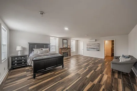 a kitchen with a sink appliances and cabinets