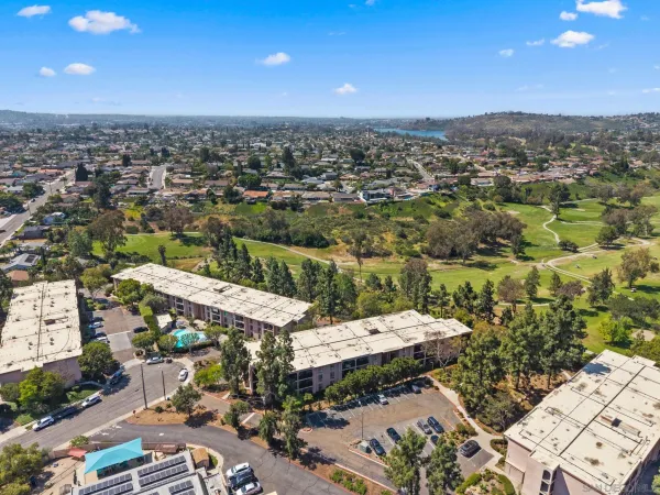 an aerial view of a house with a garden