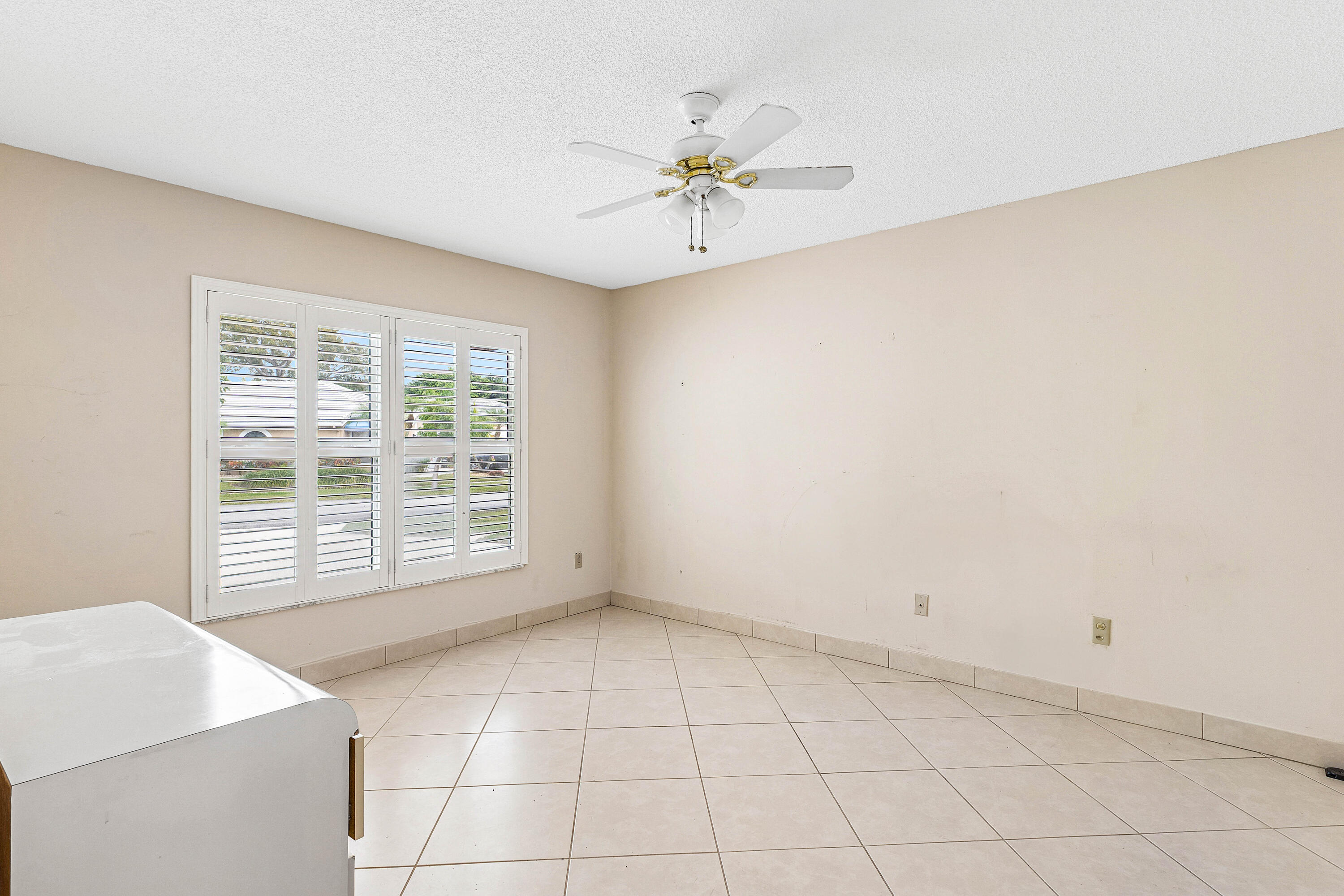 6249 Beaconwood Road Lake Worth, FL 33467 - Photo 25 of 46 a view of an empty room with a window