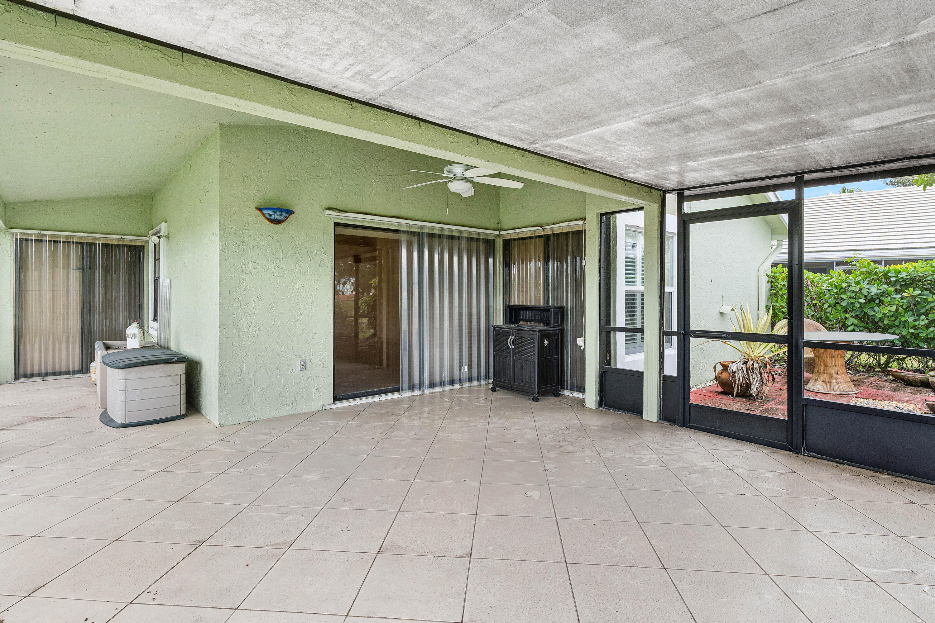6249 Beaconwood Road Lake Worth, FL 33467 - Photo 28 of 46 a view of an outdoor space with porch and furniture