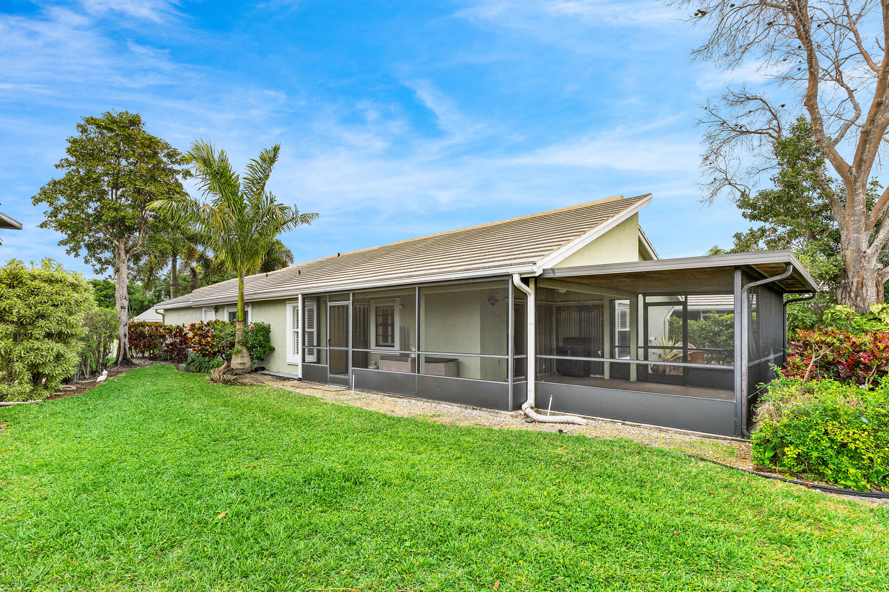 6249 Beaconwood Road Lake Worth, FL 33467 - Photo 30 of 46 front view of a house with a yard