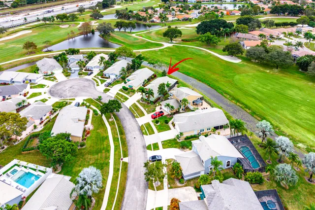 an aerial view of a pool patio swimming pool and outdoor seating