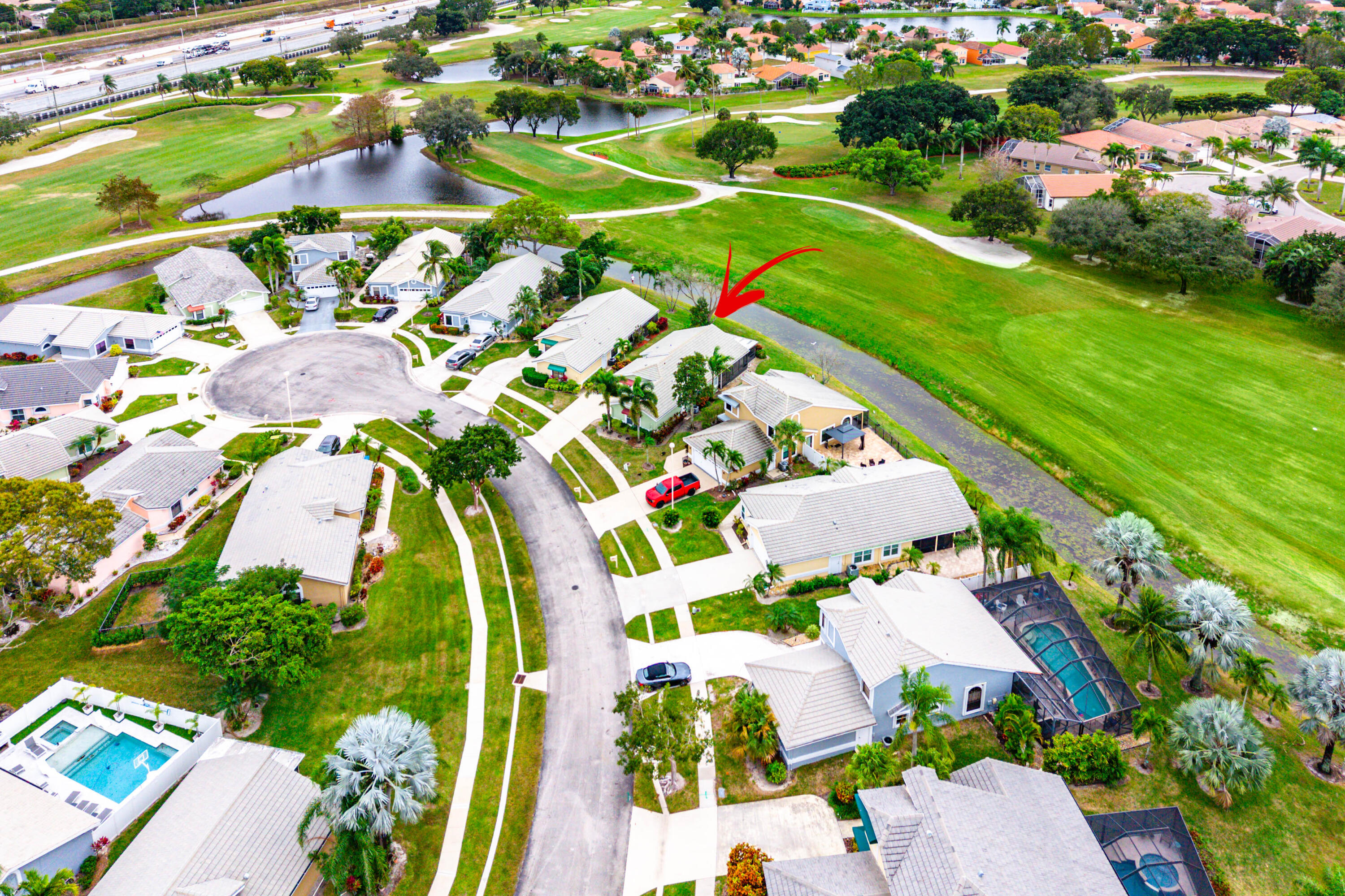 6249 Beaconwood Road Lake Worth, FL 33467 - Photo 43 of 46 an aerial view of a pool patio swimming pool and outdoor seating