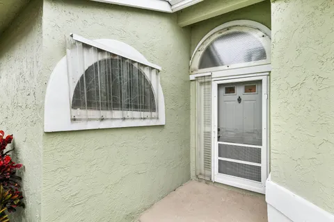 a stone house with a sink