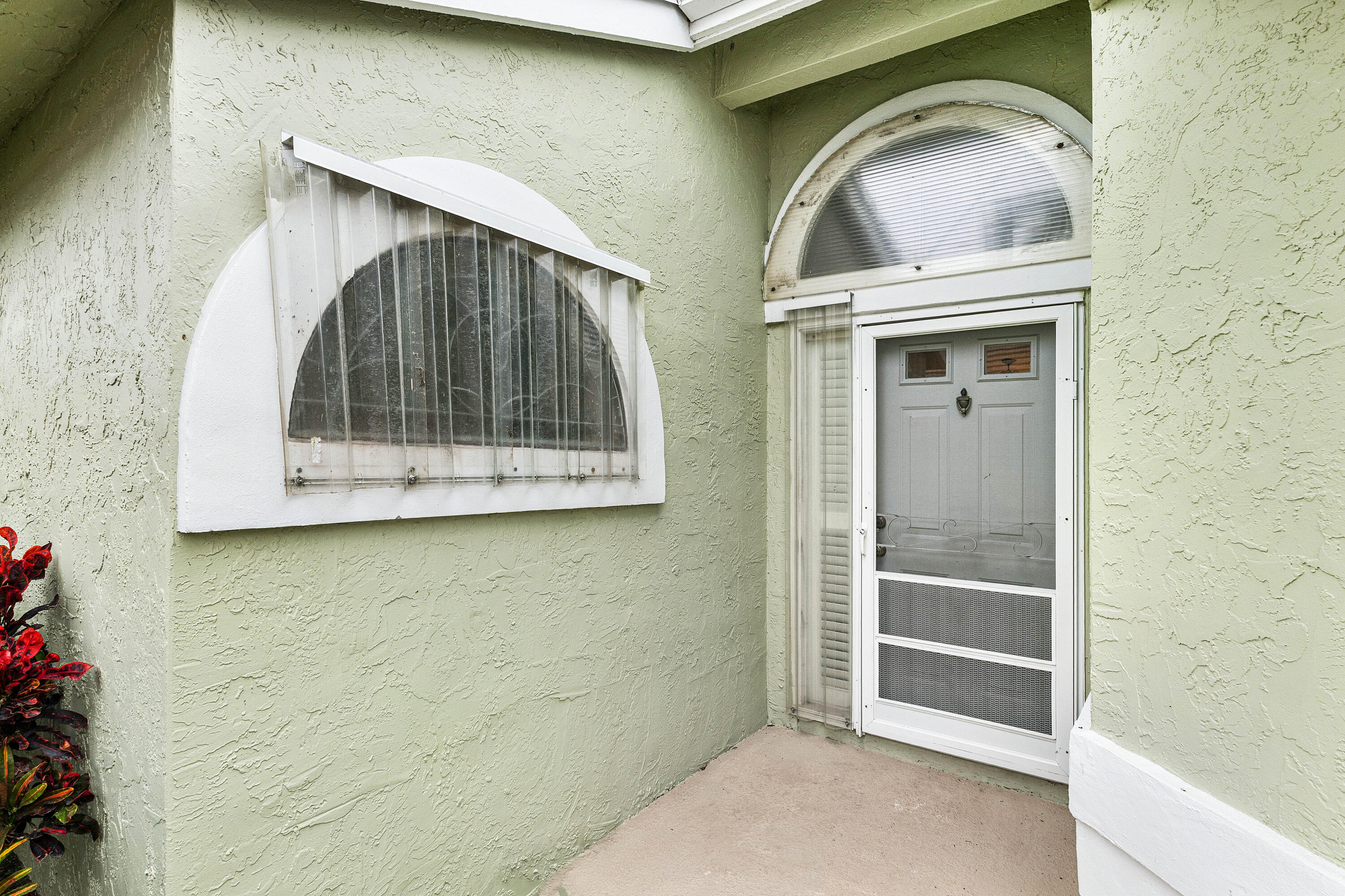 6249 Beaconwood Road Lake Worth, FL 33467 - Photo 6 of 46 a stone house with a sink