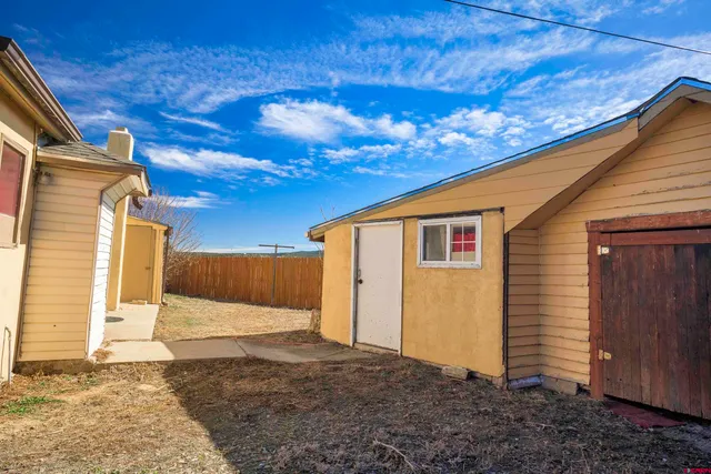 a house with trees in front of it