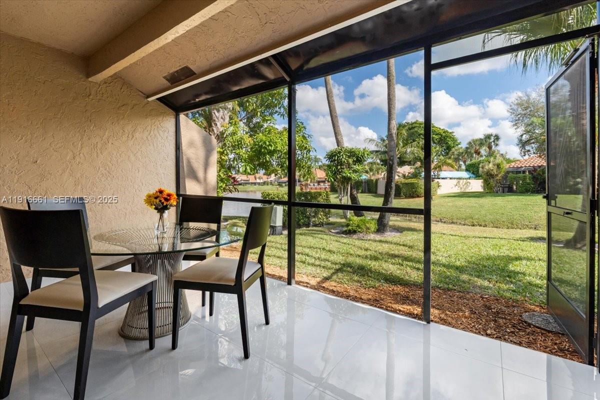 22708 Meridiana Drive Boca Raton, FL 33433 - Photo 39 of 46 a view of an outdoor space with furniture and garden