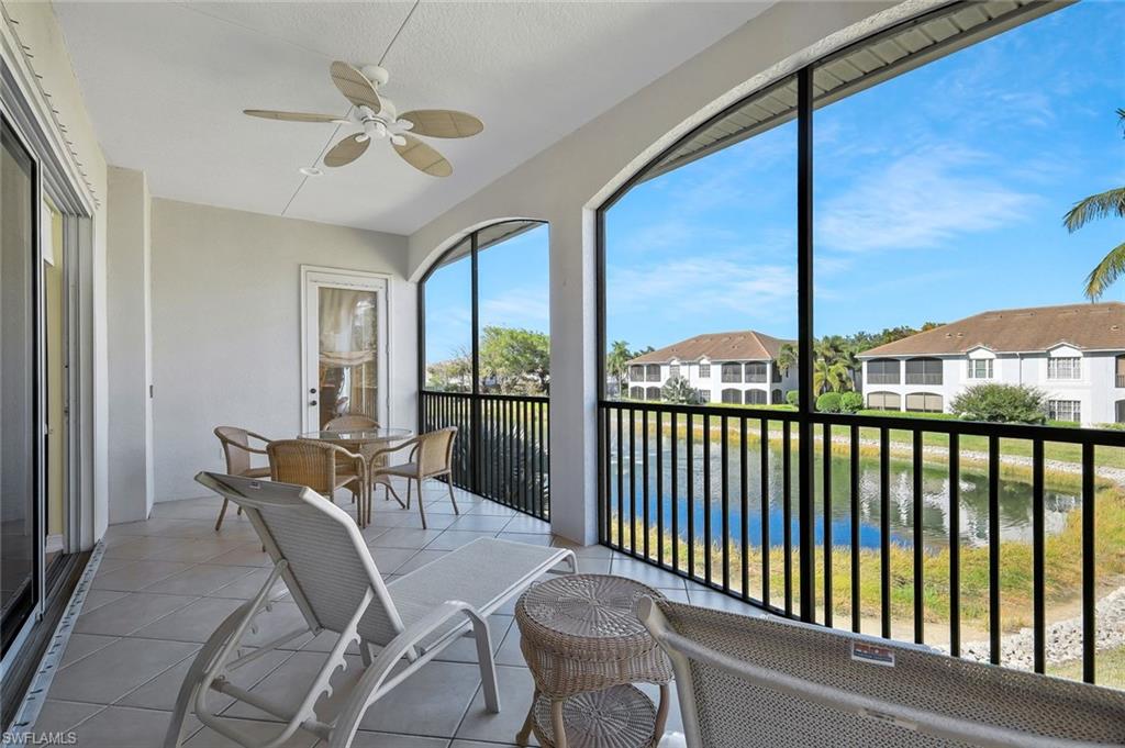 5025 Blauvelt Way, Unit 202 Naples, FL 34105 - Photo 17 of 26 a view of a balcony with furniture