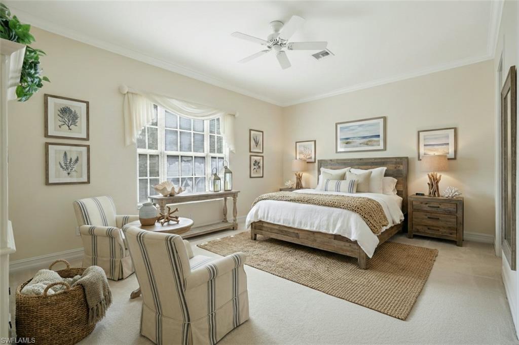 5025 Blauvelt Way, Unit 202 Naples, FL 34105 - Photo 8 of 26 a bedroom with a bed furniture and a window