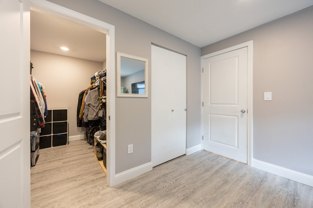 605 Franklin Crossing Road, Unit 605 Franklin, MA 02038 - Photo 13 of 31 a view of a livingroom with closet and a window