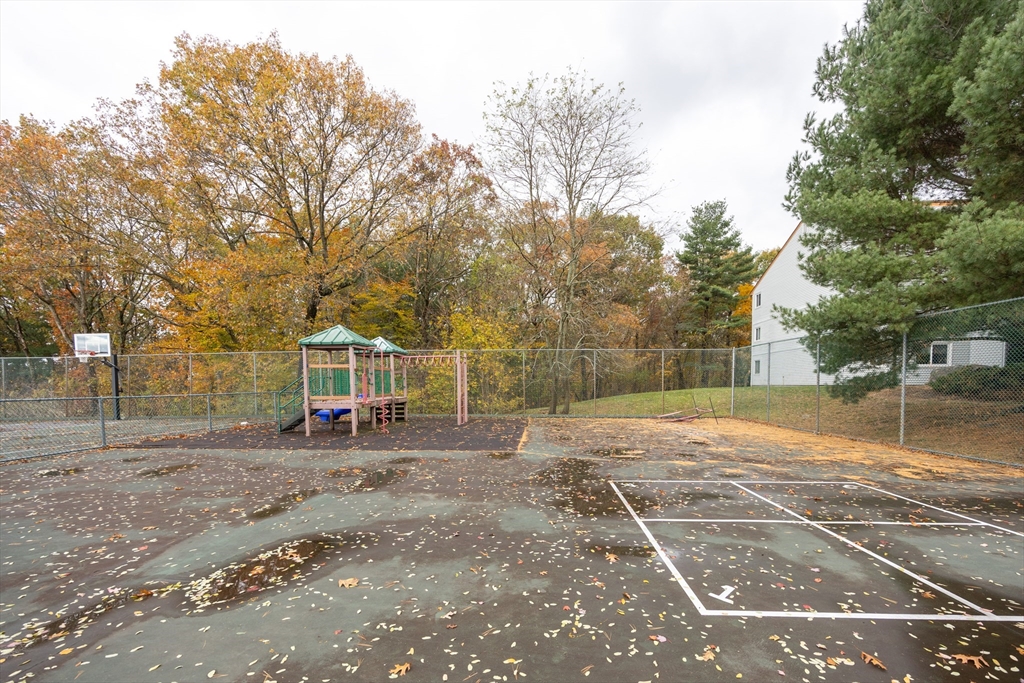 605 Franklin Crossing Road, Unit 605 Franklin, MA 02038 - Photo 25 of 31 a view of a yard with basketball court