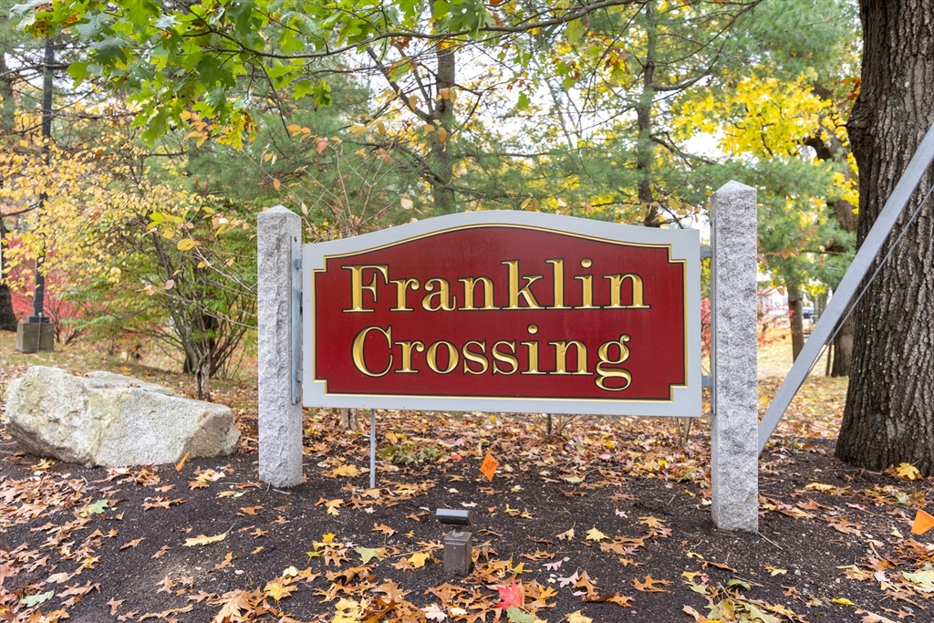 605 Franklin Crossing Road, Unit 605 Franklin, MA 02038 - Photo 30 of 31 a sign broad