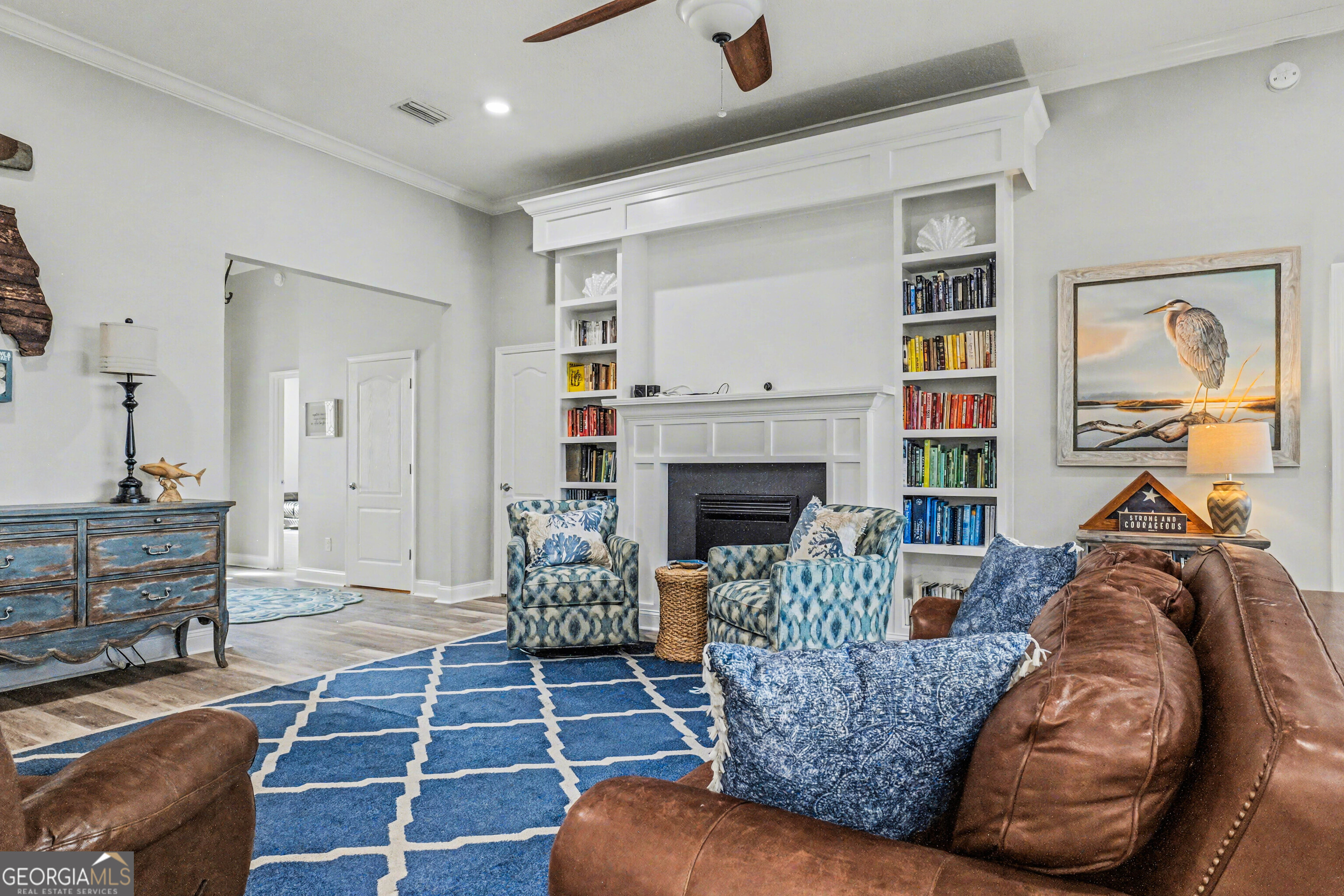 97222 Pirates Point Road Yulee, FL 32097 - Photo 11 of 82 a living room with furniture and a fireplace