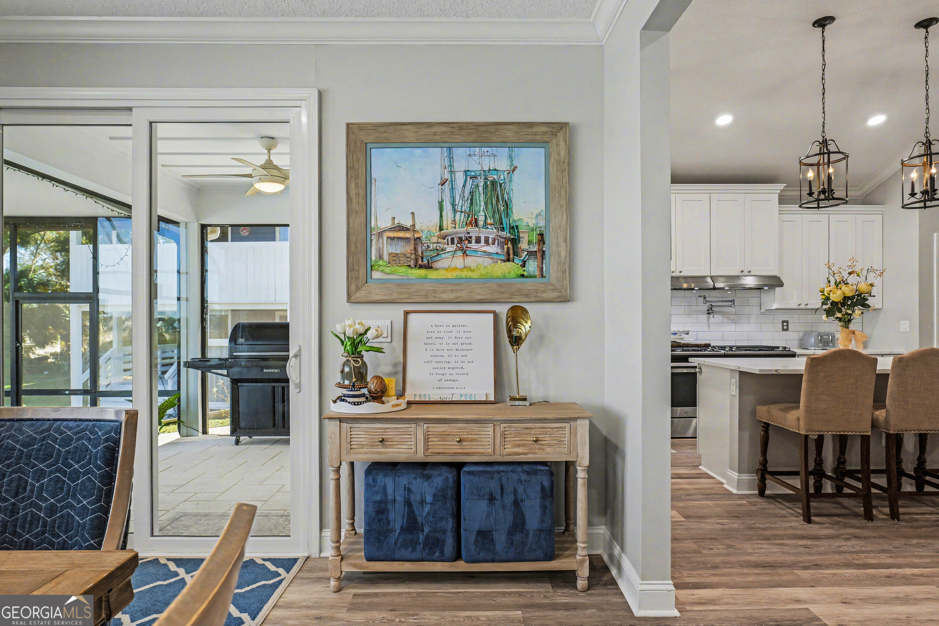 97222 Pirates Point Road Yulee, FL 32097 - Photo 23 of 82 a living room with fireplace furniture and a wooden floor
