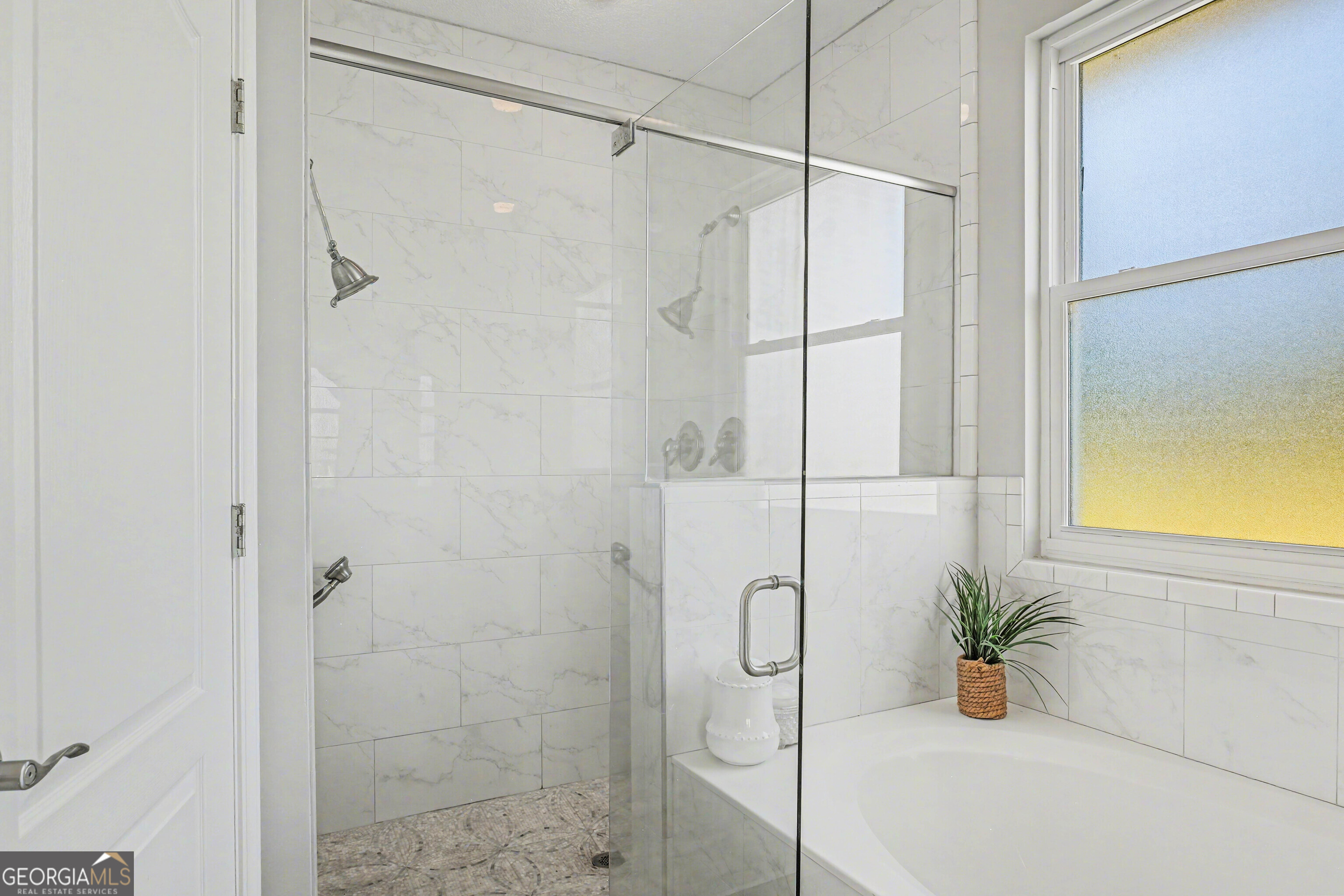 97222 Pirates Point Road Yulee, FL 32097 - Photo 34 of 82 a bathroom with a shower and a shower