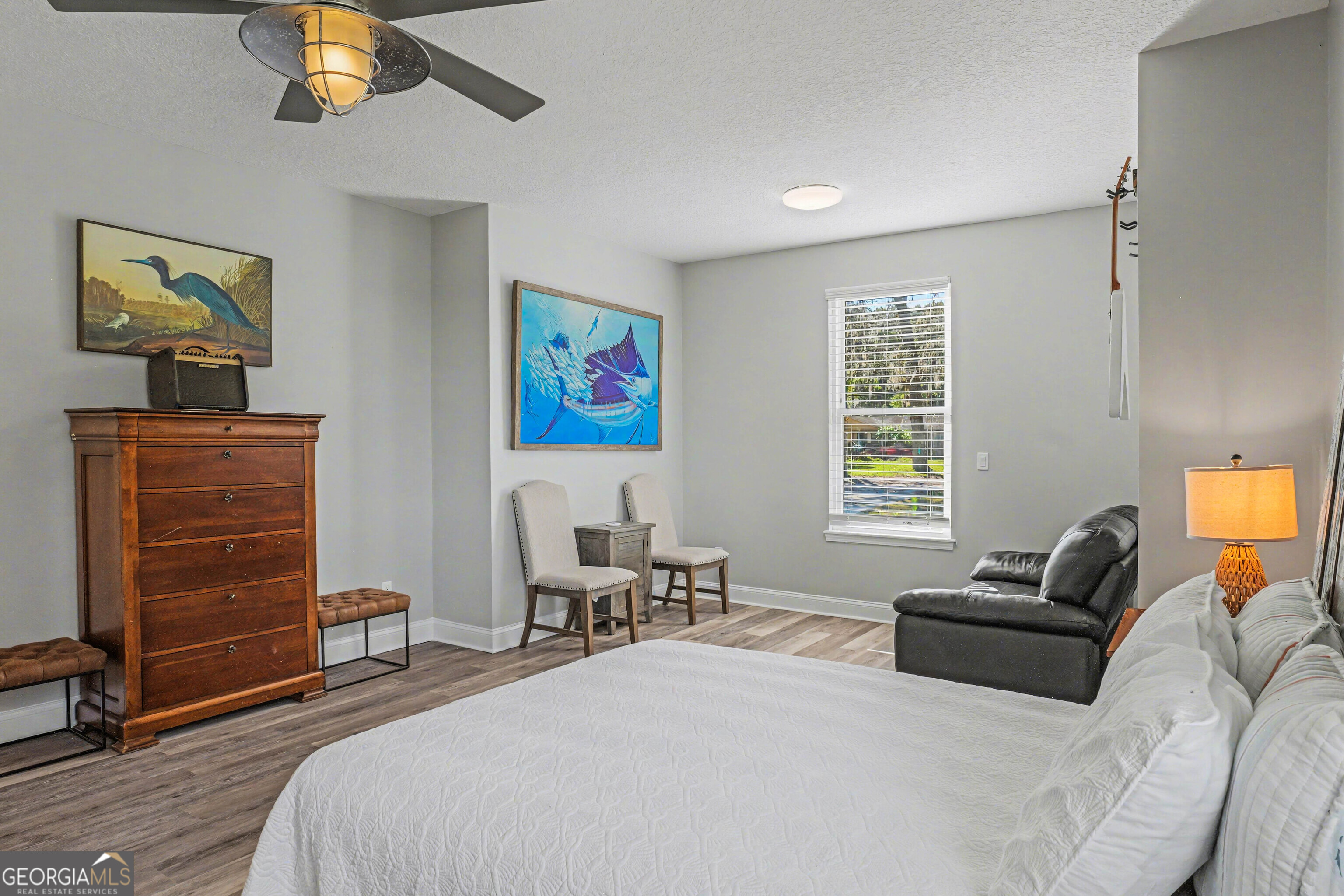 97222 Pirates Point Road Yulee, FL 32097 - Photo 36 of 82 a bedroom with a bed and a couch