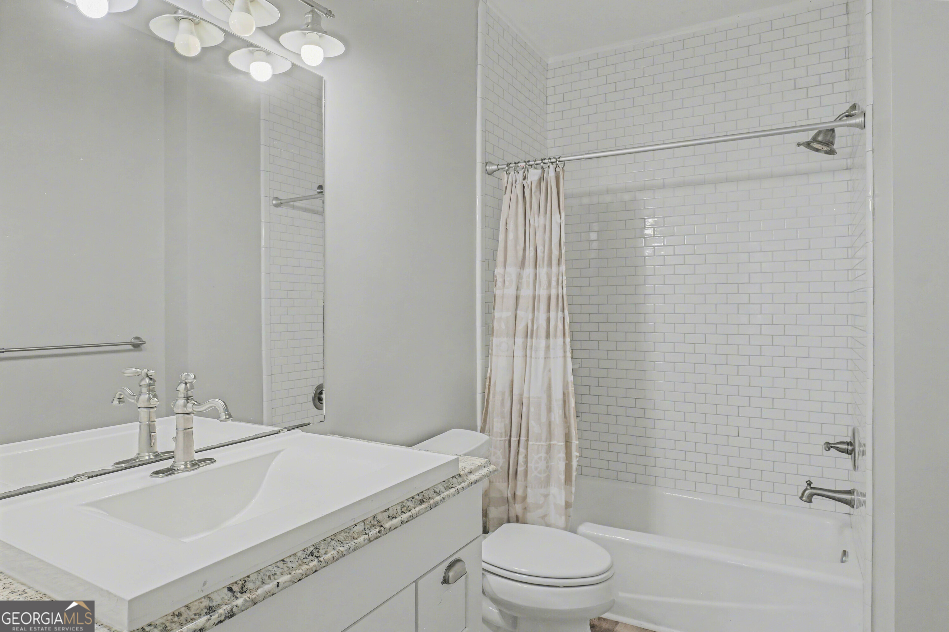 97222 Pirates Point Road Yulee, FL 32097 - Photo 40 of 82 a bathroom with a sink toilet and shower