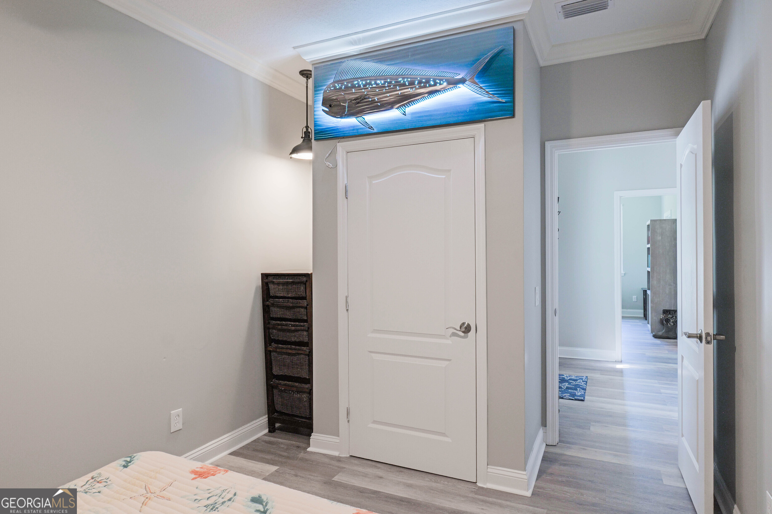 97222 Pirates Point Road Yulee, FL 32097 - Photo 43 of 82 a view of a hallway with wooden floor and closet