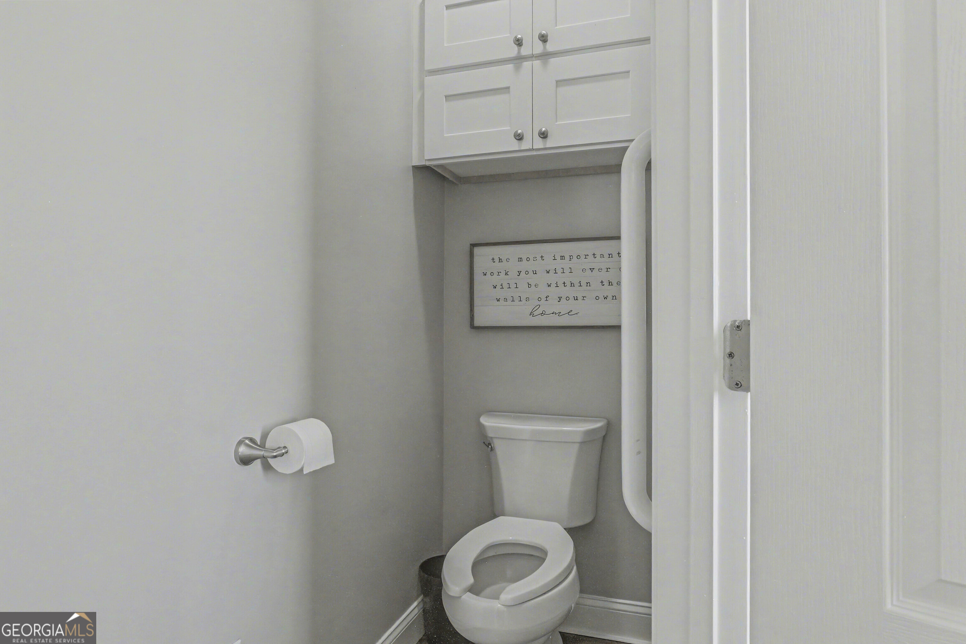 97222 Pirates Point Road Yulee, FL 32097 - Photo 48 of 82 a white toilet sitting next to a bathroom sink