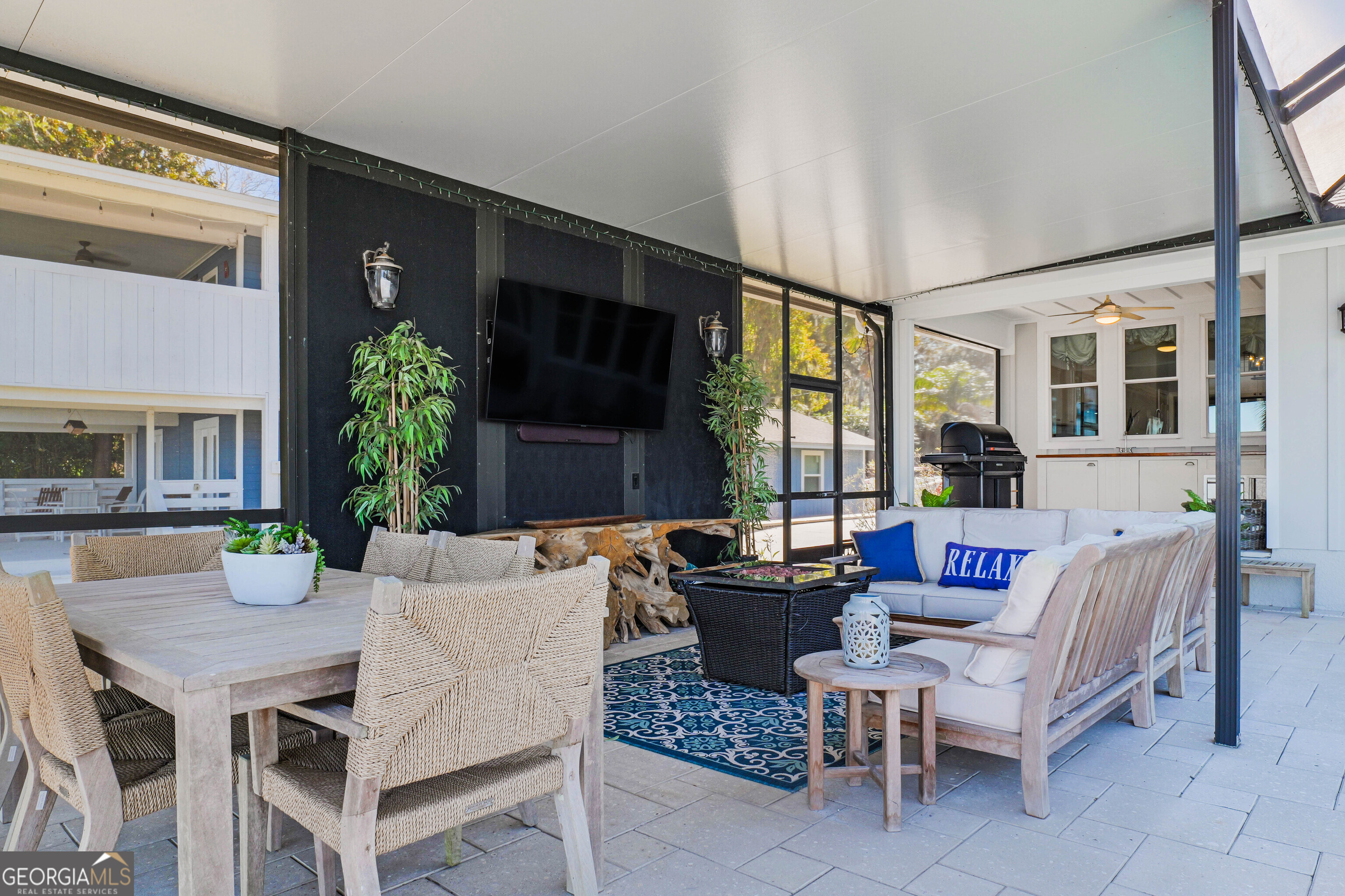 97222 Pirates Point Road Yulee, FL 32097 - Photo 56 of 82 a view of a house with backyard and sitting area