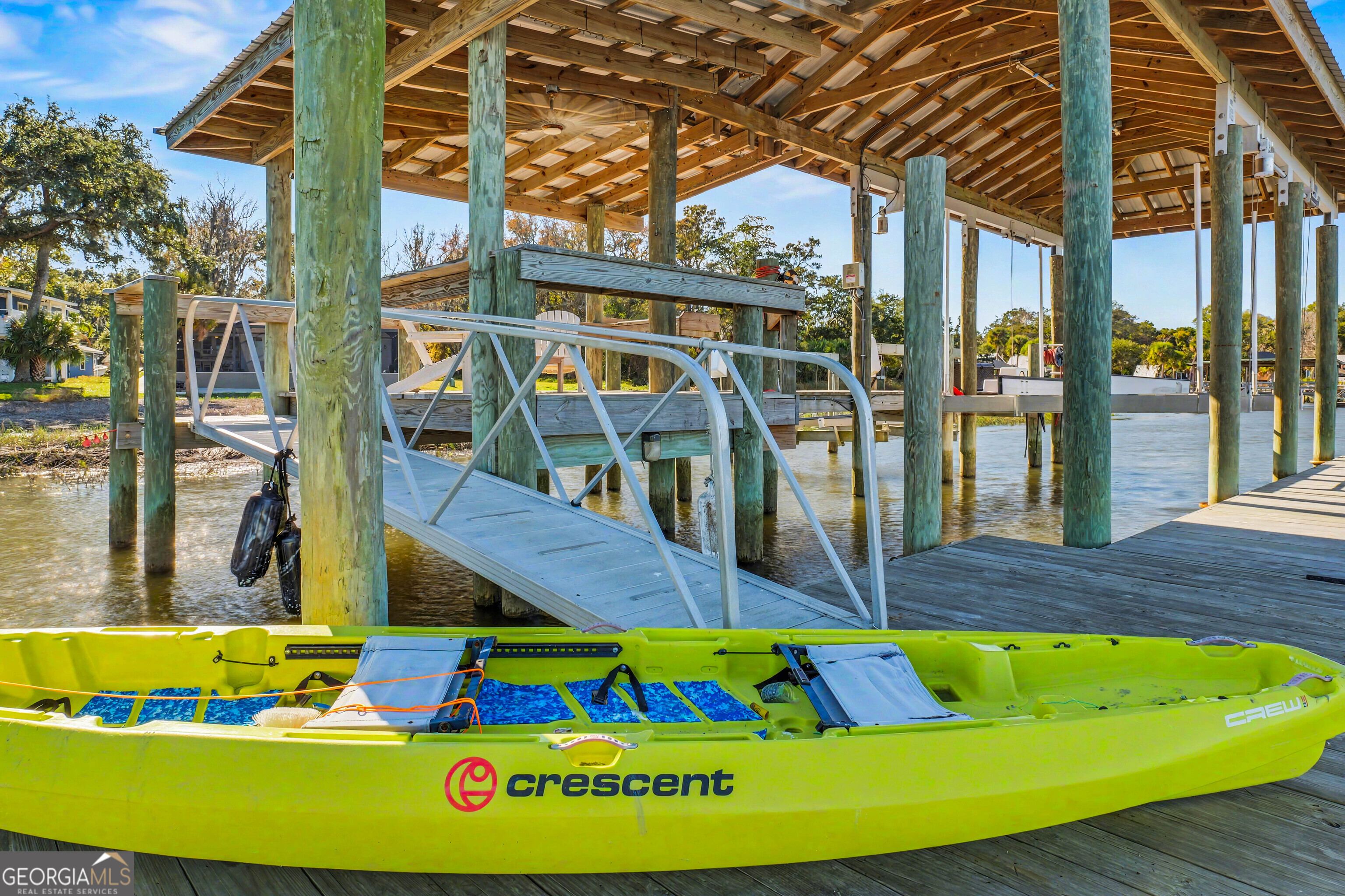 97222 Pirates Point Road Yulee, FL 32097 - Photo 73 of 82 a view of a swimming pool with an outdoor seating
