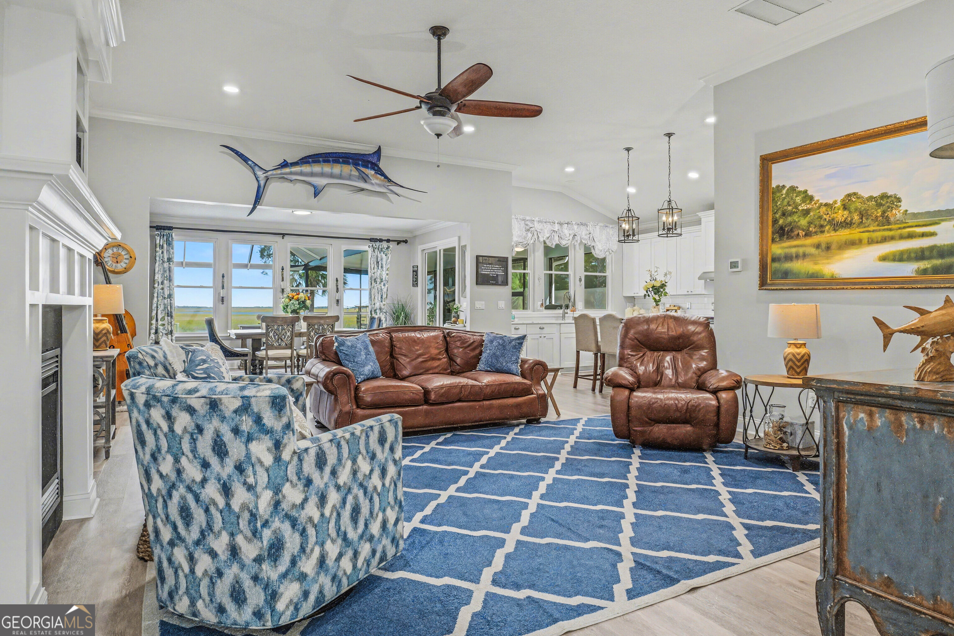 97222 Pirates Point Road Yulee, FL 32097 - Photo 8 of 82 a living room with furniture a rug and a flat screen tv